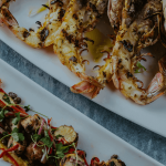 two plates of food on a table.