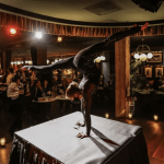 a person doing a trick on a table.