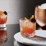 a close up of a drink on a table.