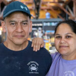a man and a woman posing for a picture.