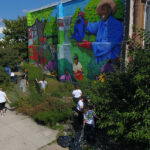 a large mural on the side of a building.