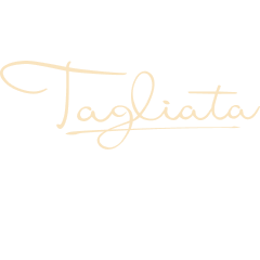 a black and white photo with the word tagliata written in cursive.