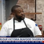 a man in an apron is on the news.
