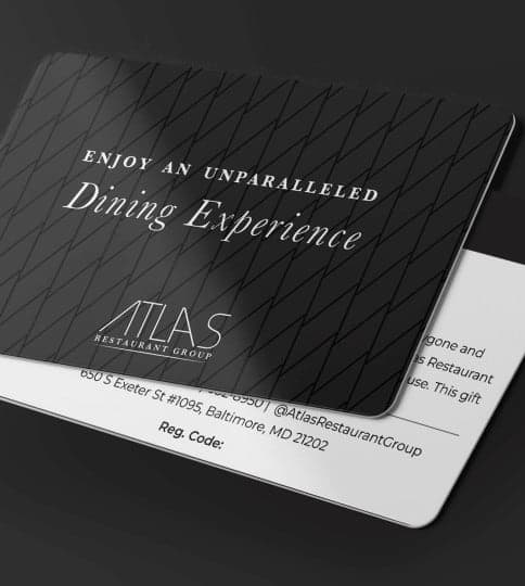 a black and white card with the words enjoy an unrivaled dining experience.